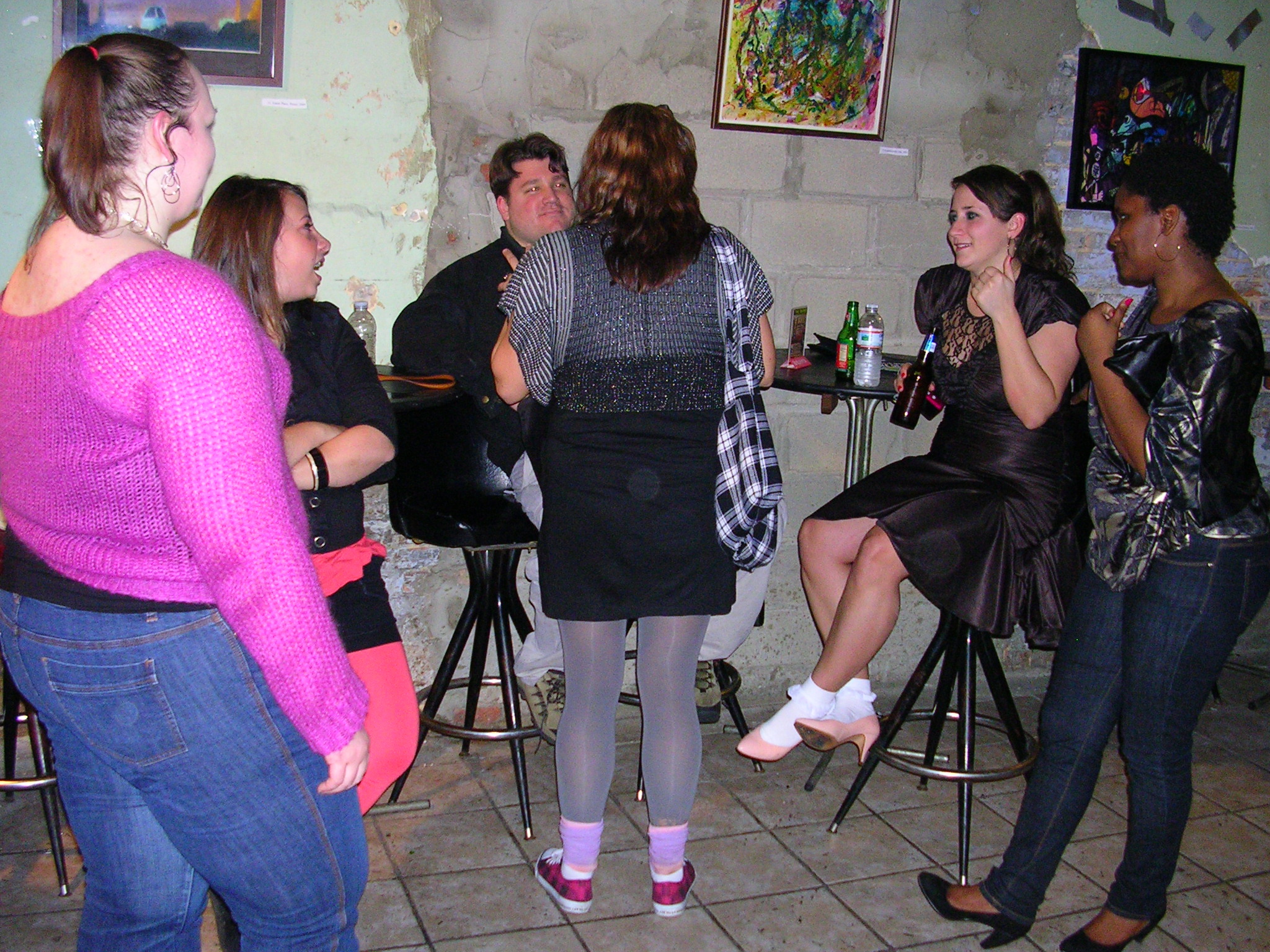 Friends gather to talk and dance at The Depot